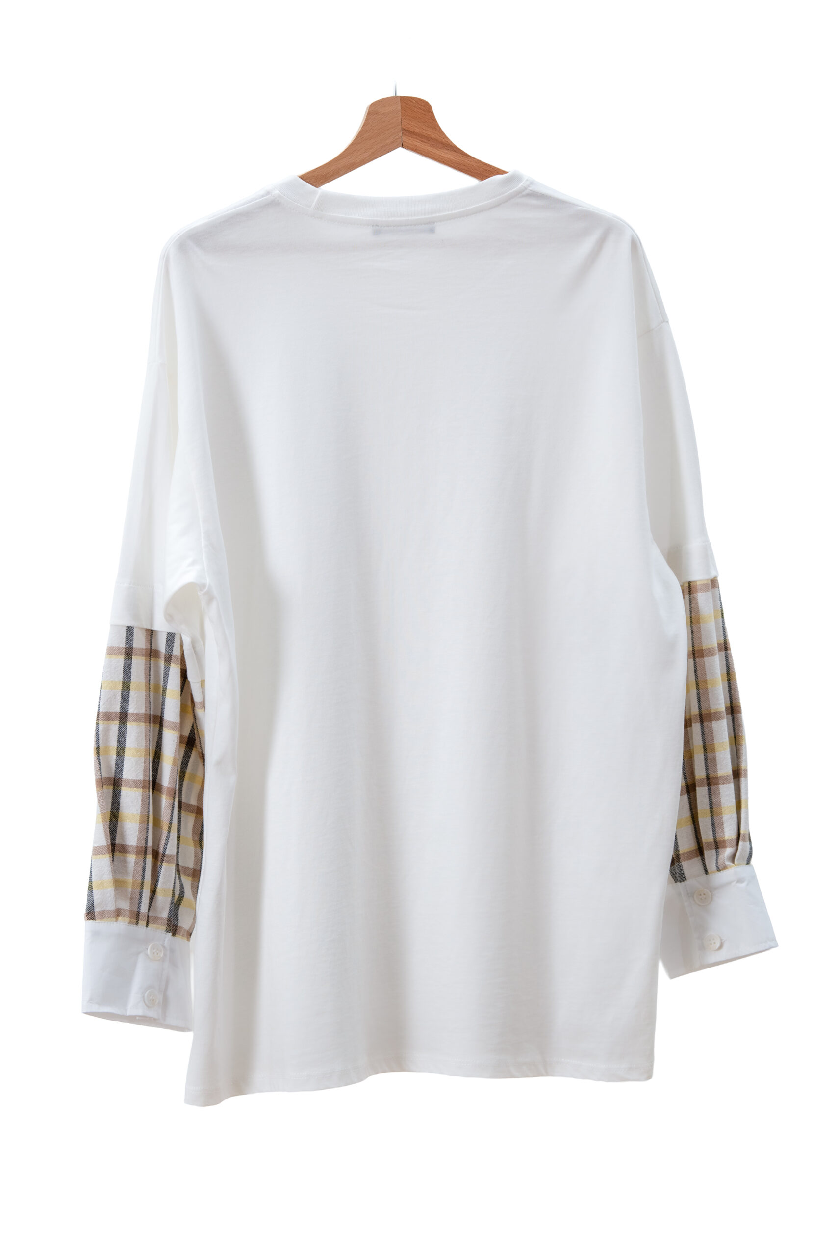 White long-sleeve shirt with plaid sleeves